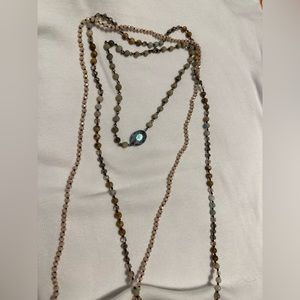 3 necklaces in blues creams and browns with crystals